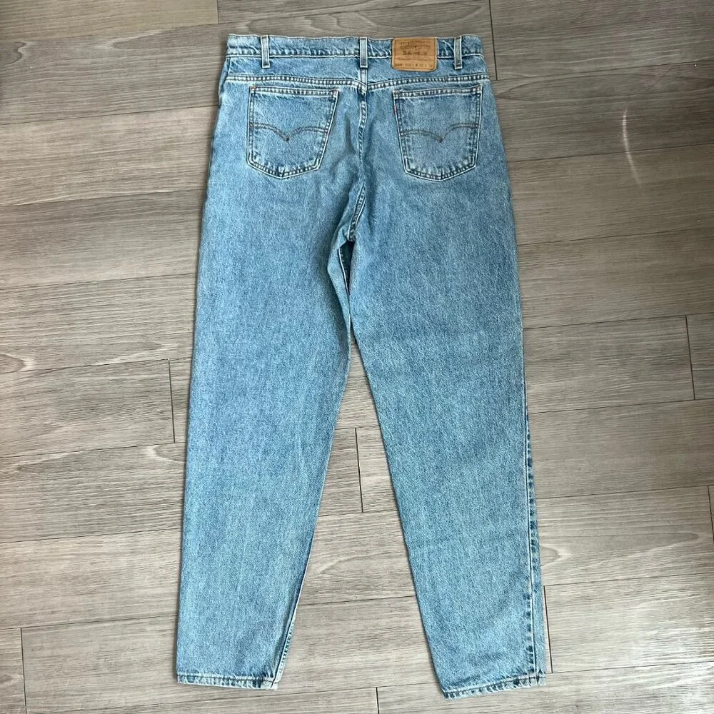 90s Levi’s 550s Relaxed Fit Tapered Leg Orange Tab Light Wash Jeans Sz 38X34
